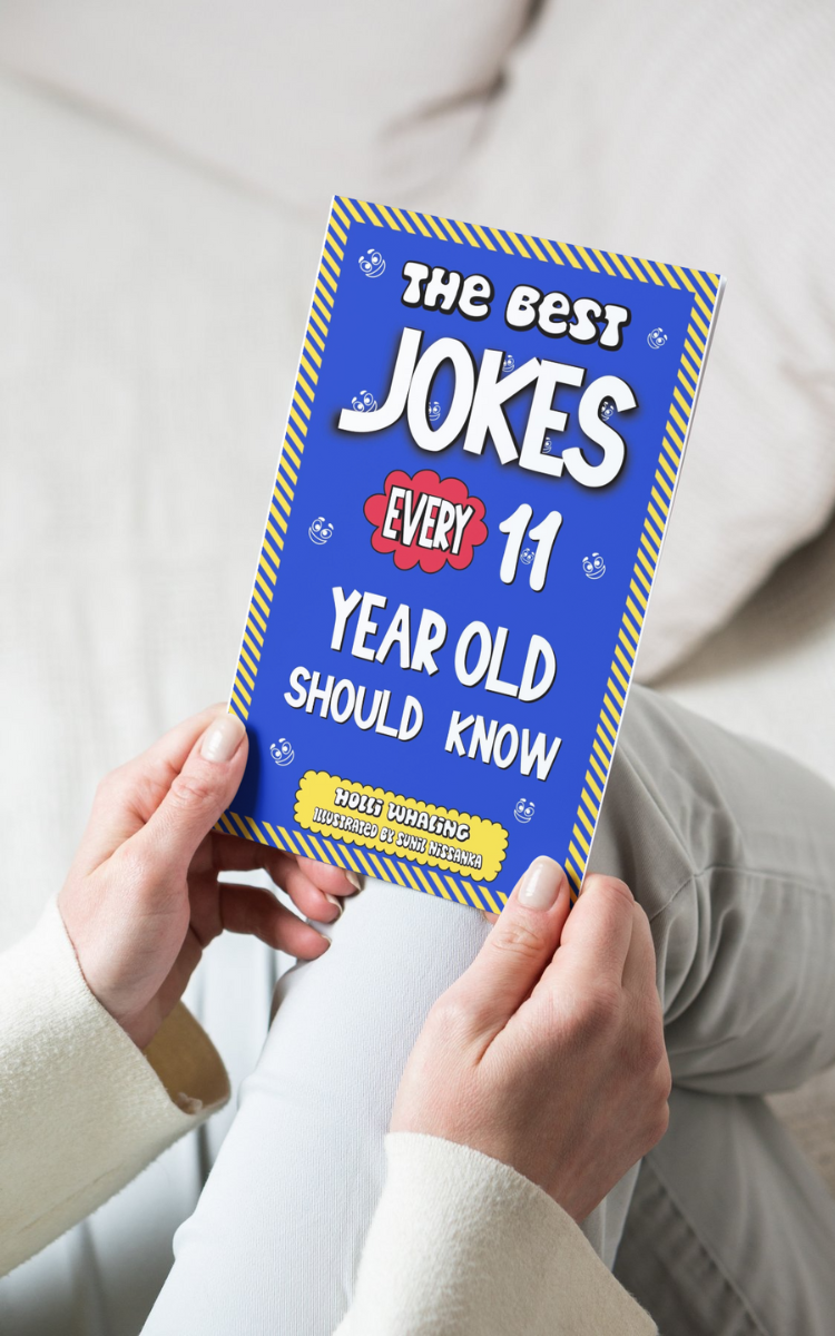 Parent looking at the Best jokes every 11 year old should know book.